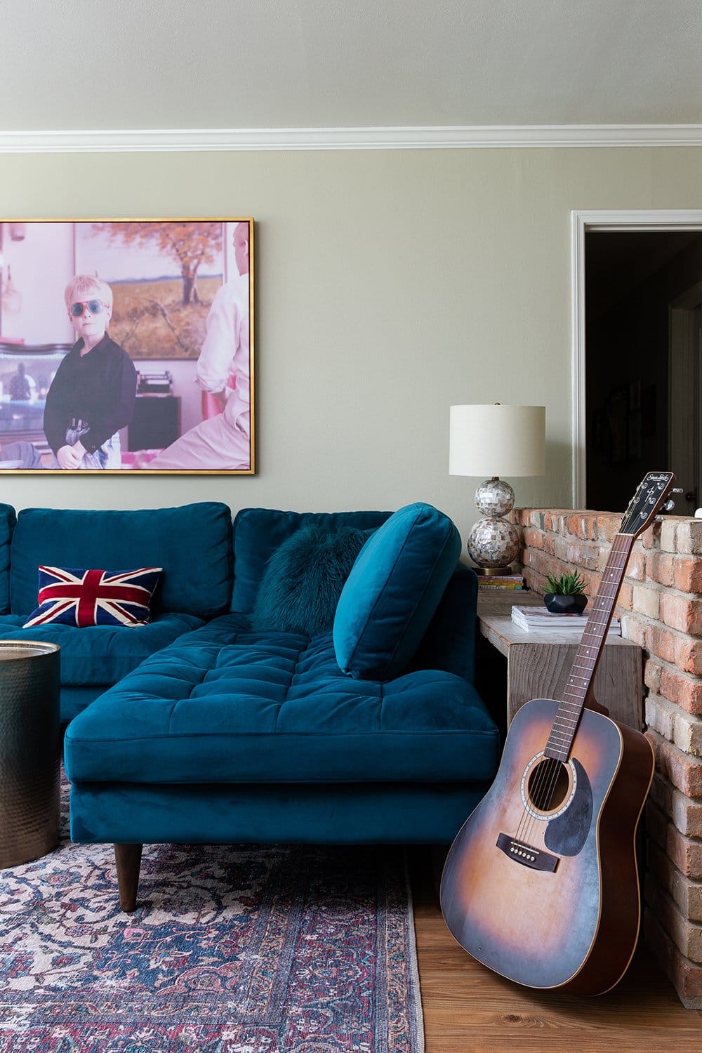 Before and After: A Family-Friendly Living Room with a Teal Sofa in Waco, Texas by interior designer Lesley Myrick