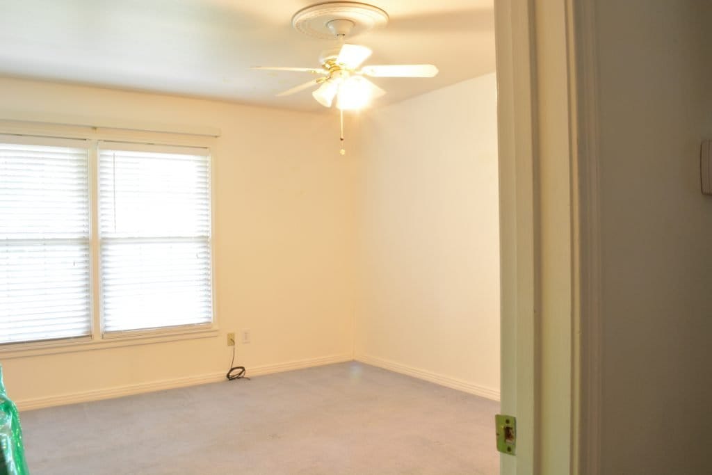 This boring white bedroom was transformed into a stunning home office by interior designer Lesley Myrick