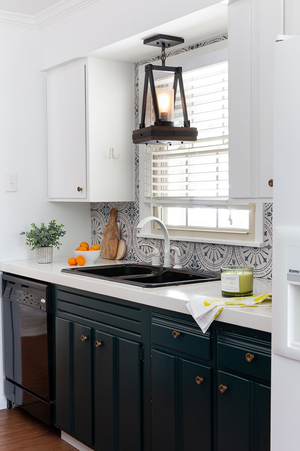 Cool backsplash stickers in this before-and-after kitchen makeover