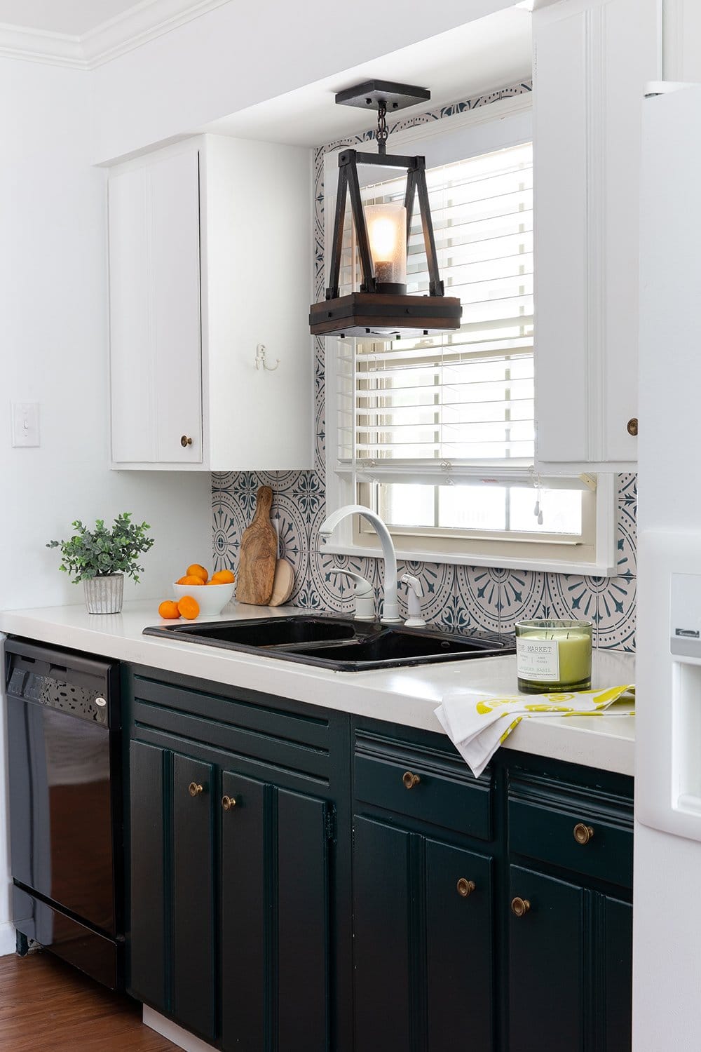 Cool backsplash stickers in this before-and-after kitchen makeover