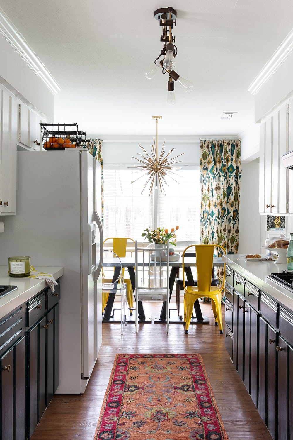  A modern dark teal kitchen by interior designer Lesley Myrick