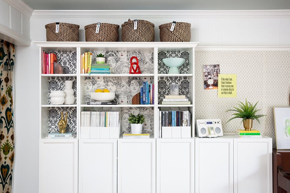 Awesome built-in bookshelves in an interior designer's home office