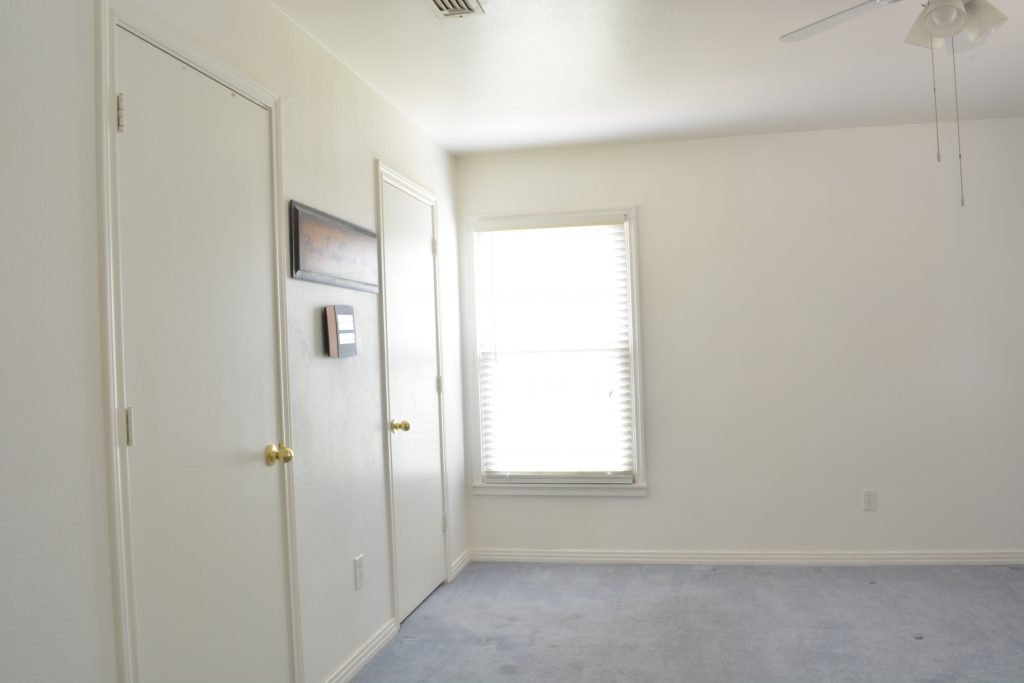 Whoa! Check out what this white box bedroom looks like after the makeover.