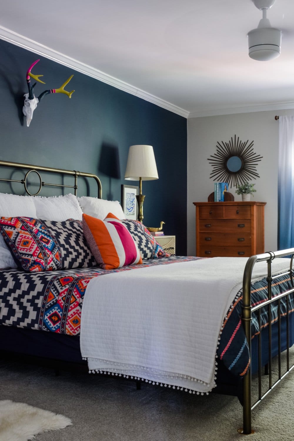 A navy bedroom by interior designer Lesley Myrick