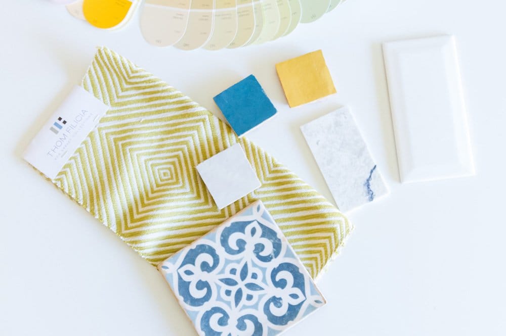 A collection of vibrant colors and patterns displayed on a white surface, showcasing creative interior design ideas.