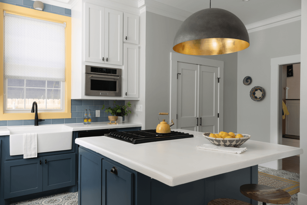 A custom walk-in pantry was added to this historic kitchen remodel project by Lesley Myrick Interior Design