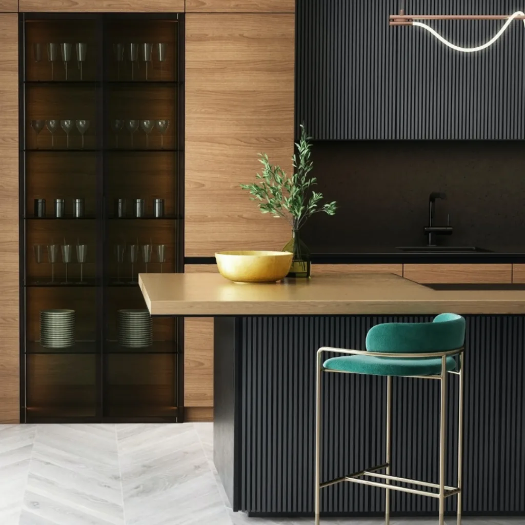 A contemporary kitchen featuring wooden cabinets and a sleek black countertop, showcasing a stylish and functional design.