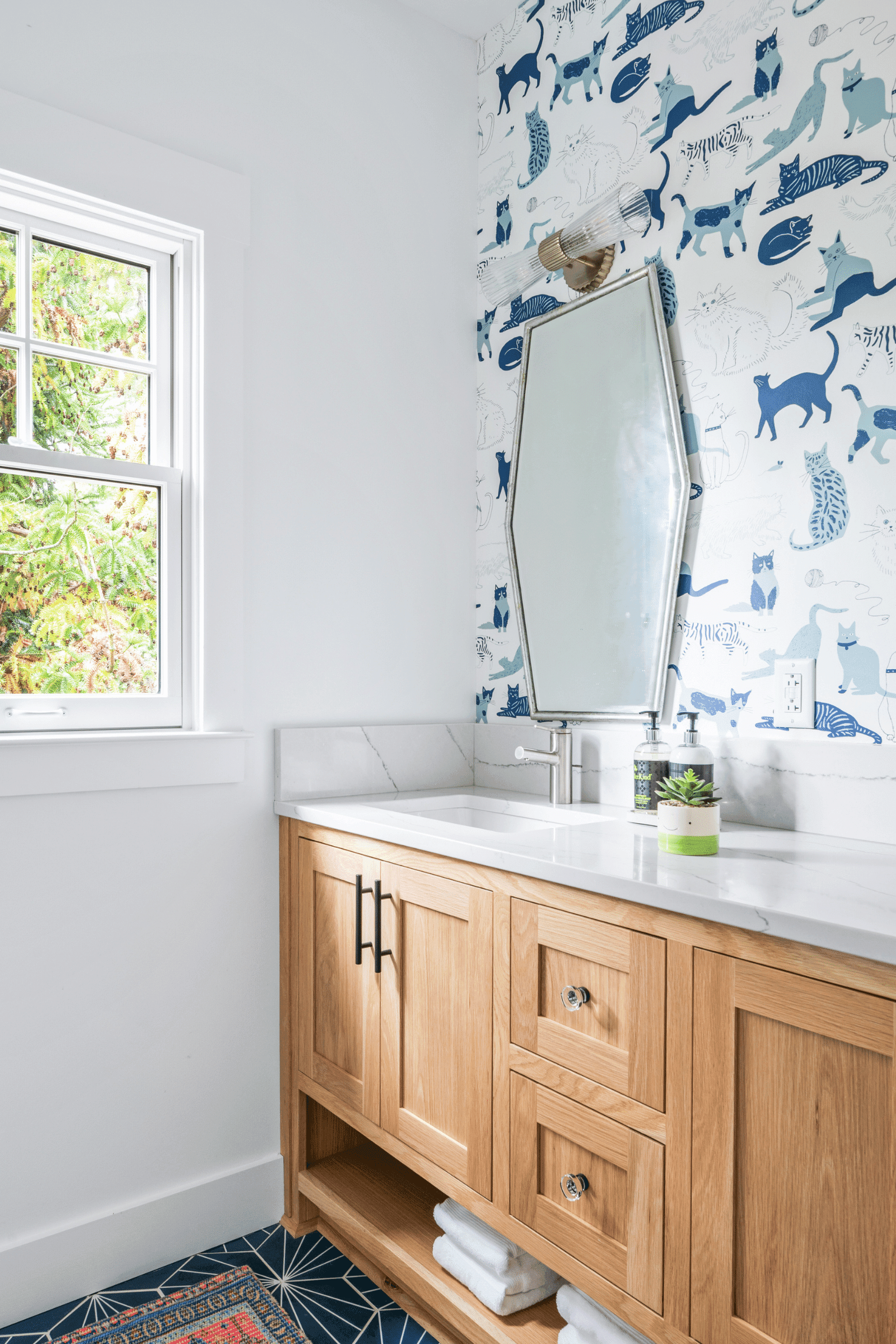 Macon new build guest house bathroom with custom vanity and cat wallpaper