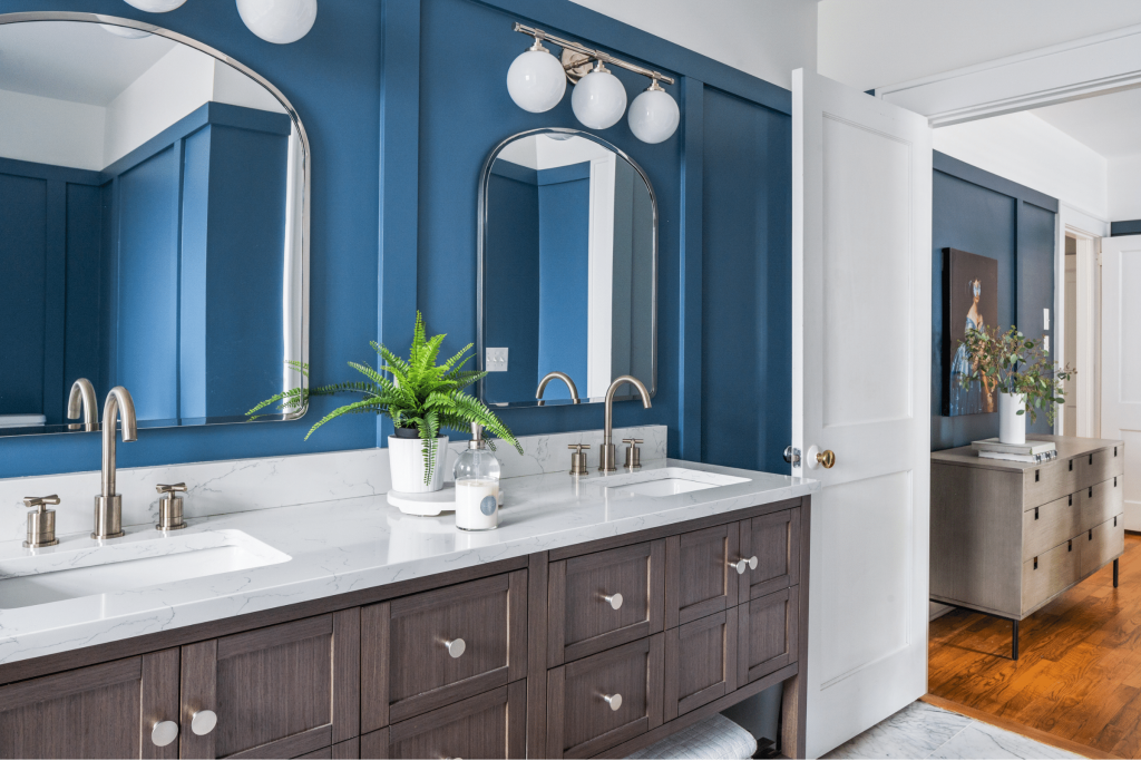 A luxe coastal-inspired blue primary bathroom in Macon, GA, designed by Lesley Myrick Interior Design