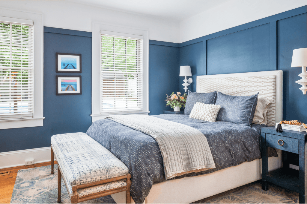 A luxe coastal-inspired blue primary bedroom in Macon, GA, designed by Lesley Myrick Interior Design