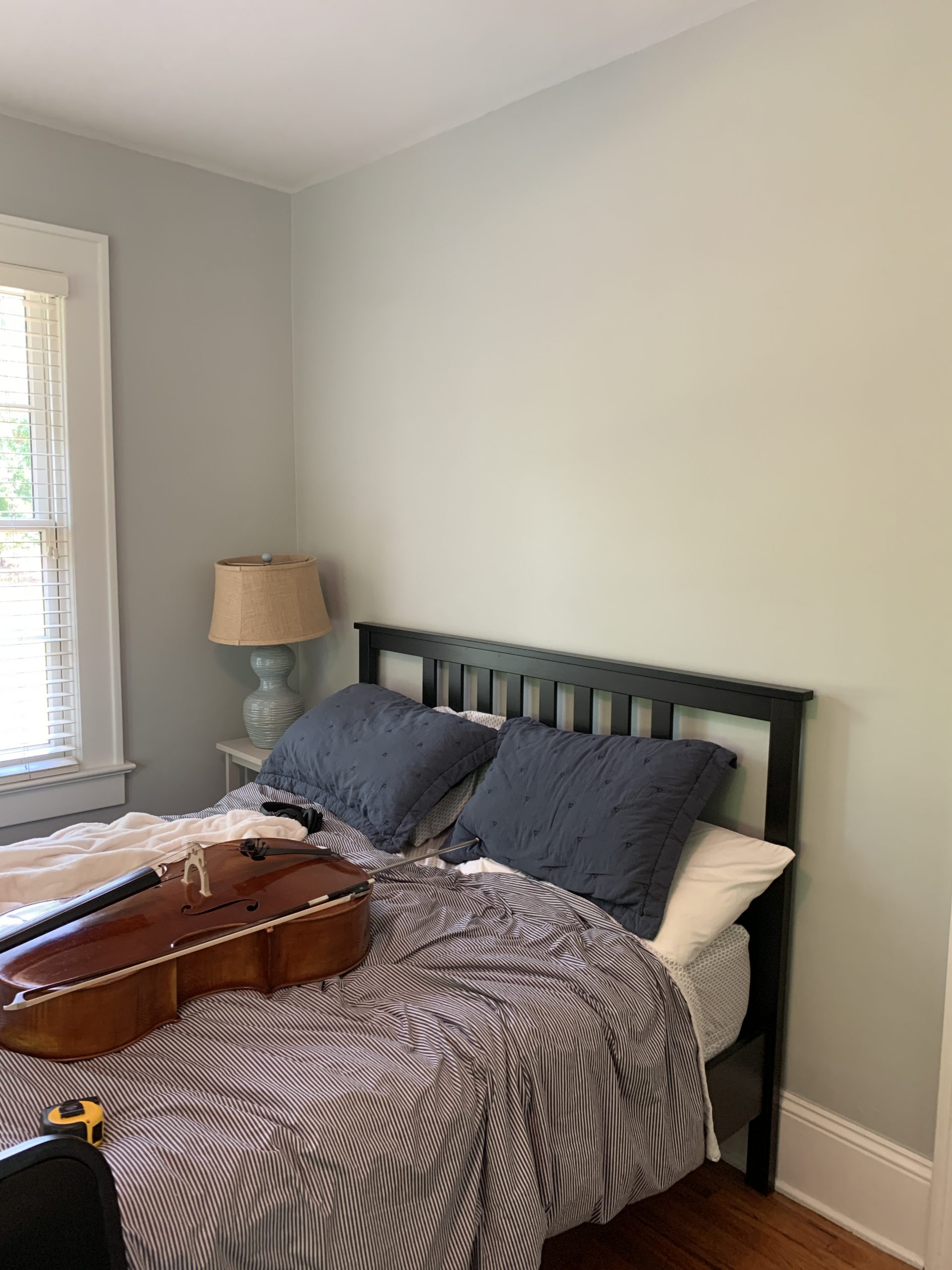 The "before" photo of a historic bungalow bedroom in Macon, GA