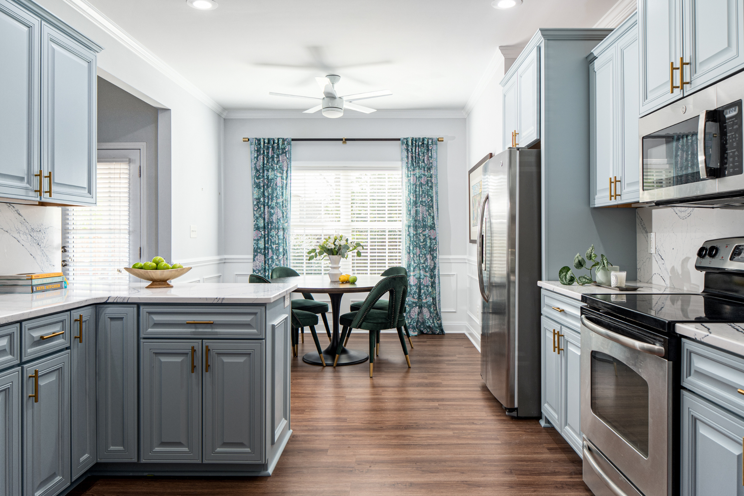 Sherwin-Williams Stardew blue kitchen designed by Atlanta luxury designer Lesley Myrick Interior Design.