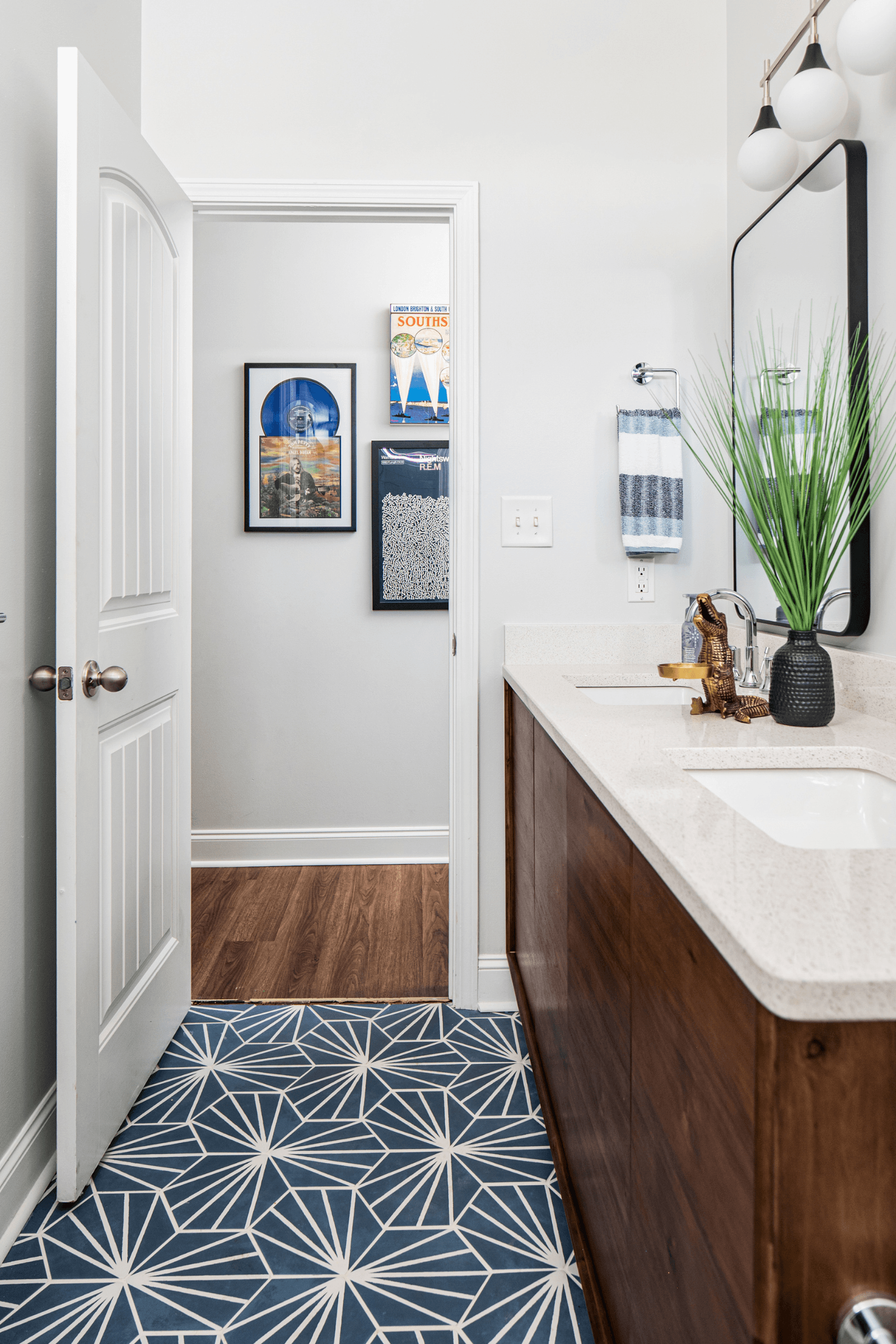 Kids blue bathroom remodel with hexagon tiles