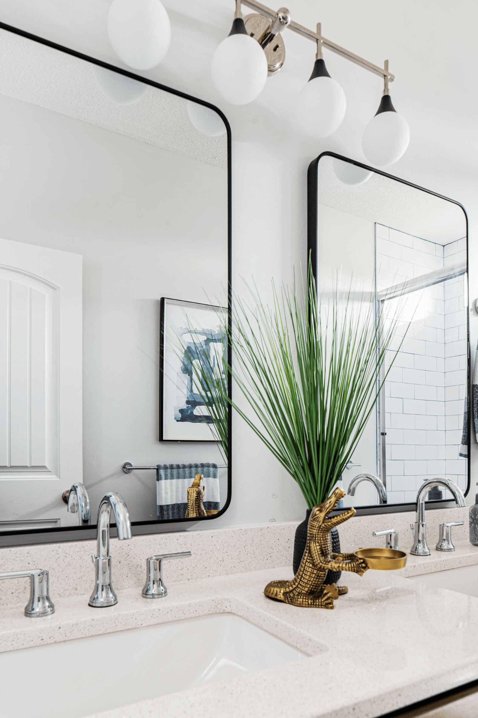 Mid-century wood vanity in a blue and white bathroom remodel