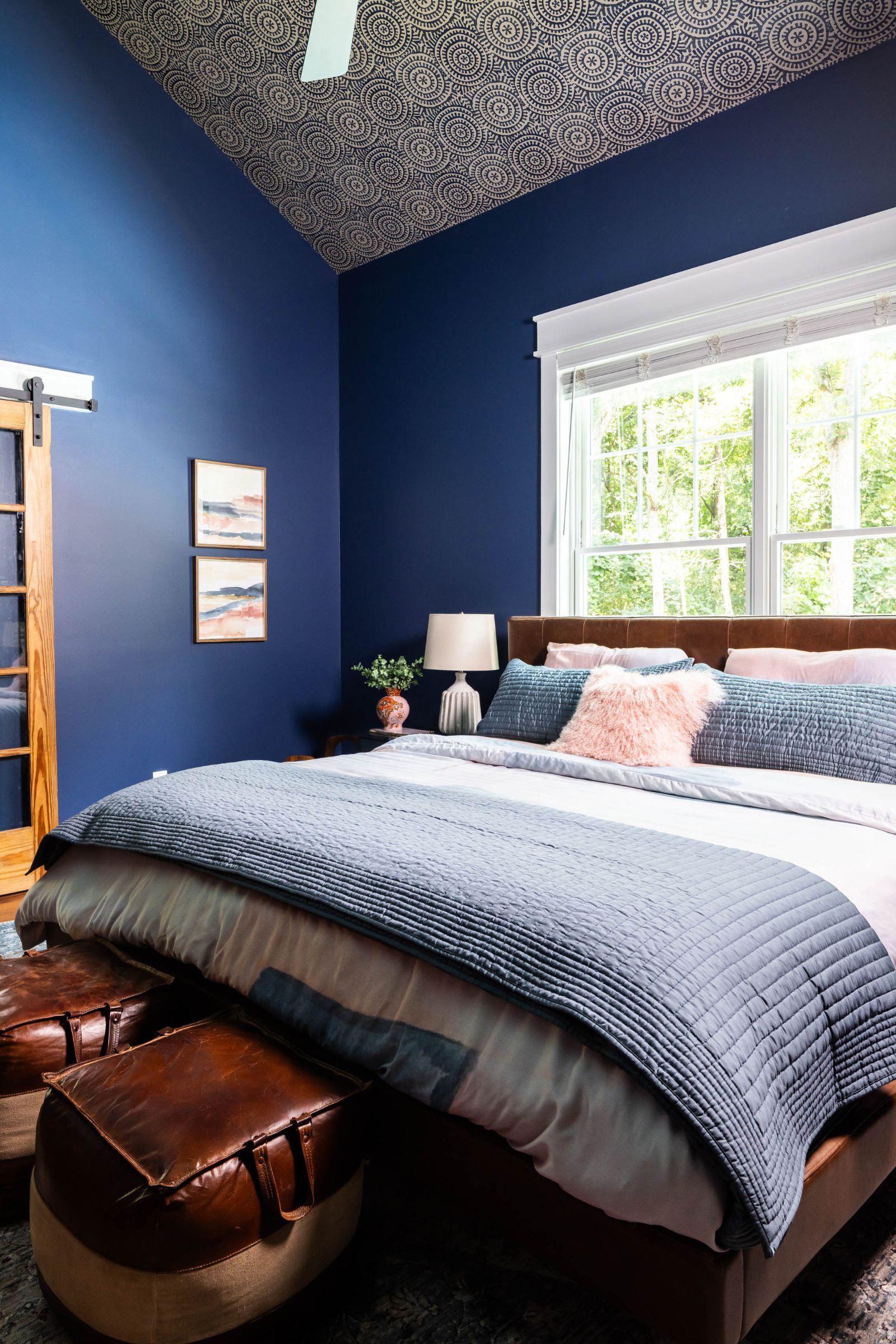 Navy blue farmhouse bedroom full-service interior design project by Lesley Myrick Interior Design in Macon, GA