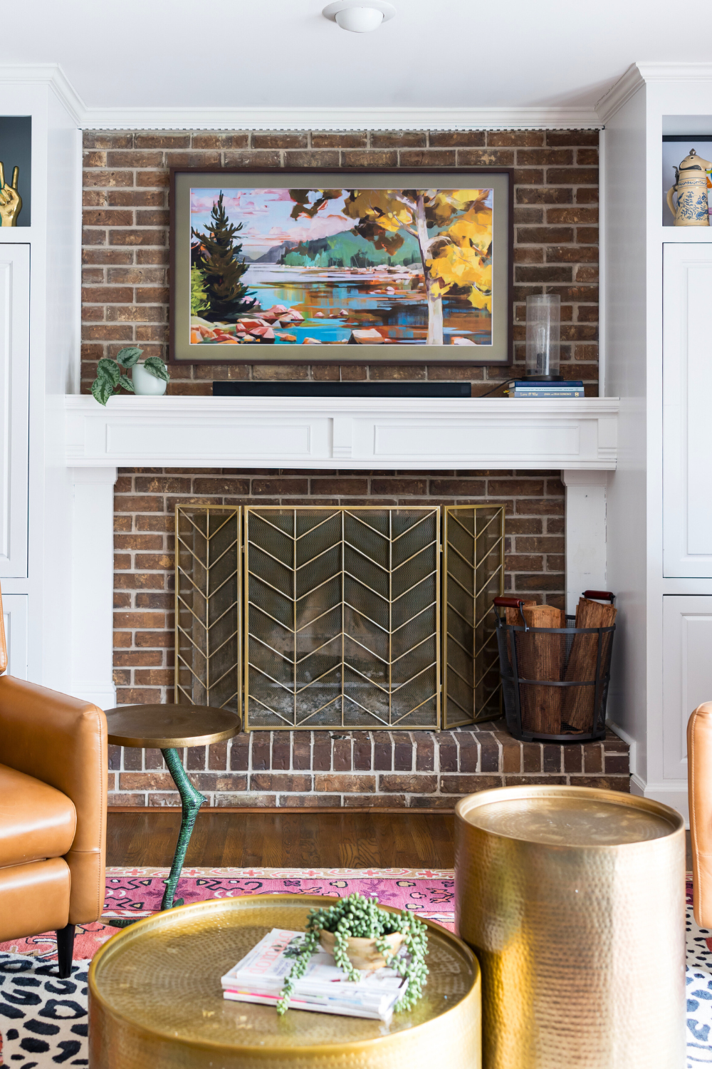 Brick fireplace in a Macon Georgia living room by interior designer Lesley Myrick