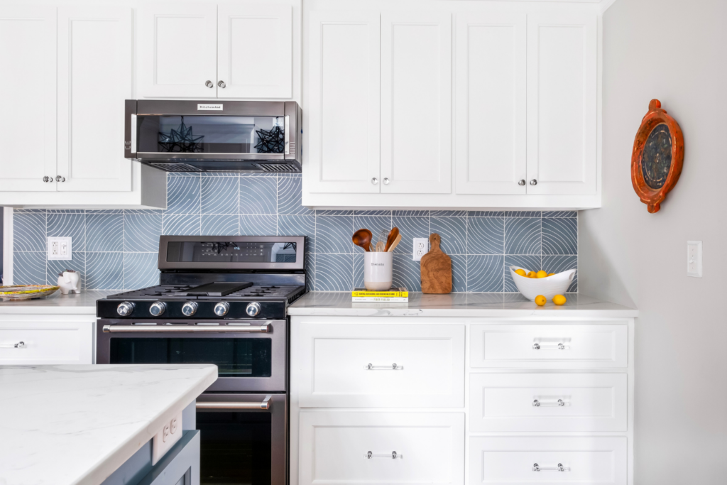 modern-kitchen-white-cabinets-blue-backsplash
