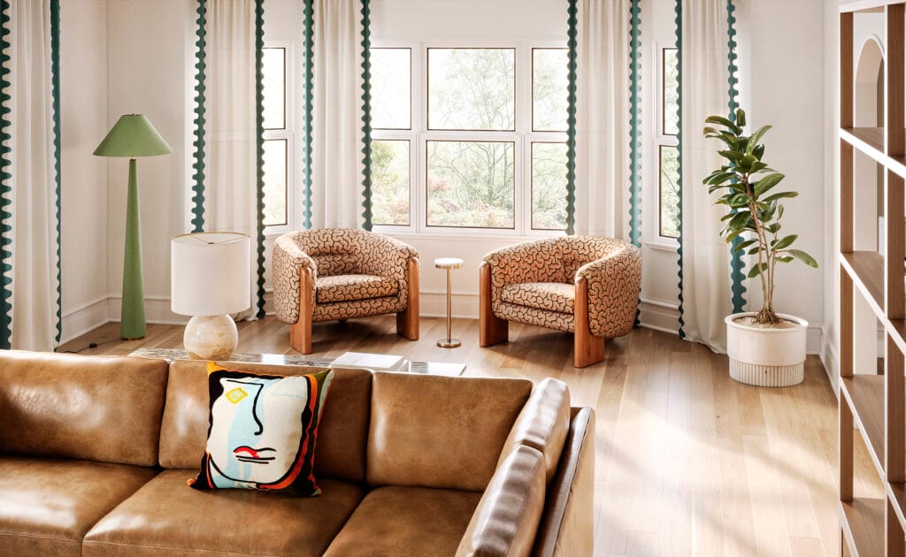 Soften the design lines in a long, narrow living room with rounded accent chairs.