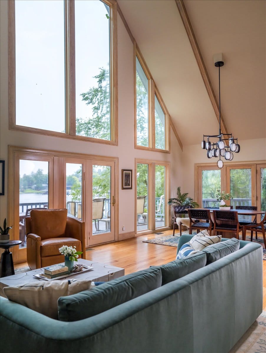 Full view from living room to dining area in Lake Sinclair home, featuring custom furnishings.