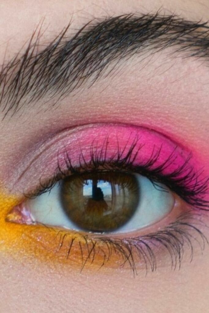 Orange and fuchsia dramatic eye makeup look