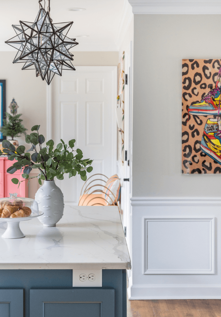 A vibrant painting displayed on a wall, showcasing intricate details and colors that enhance the room's ambiance.